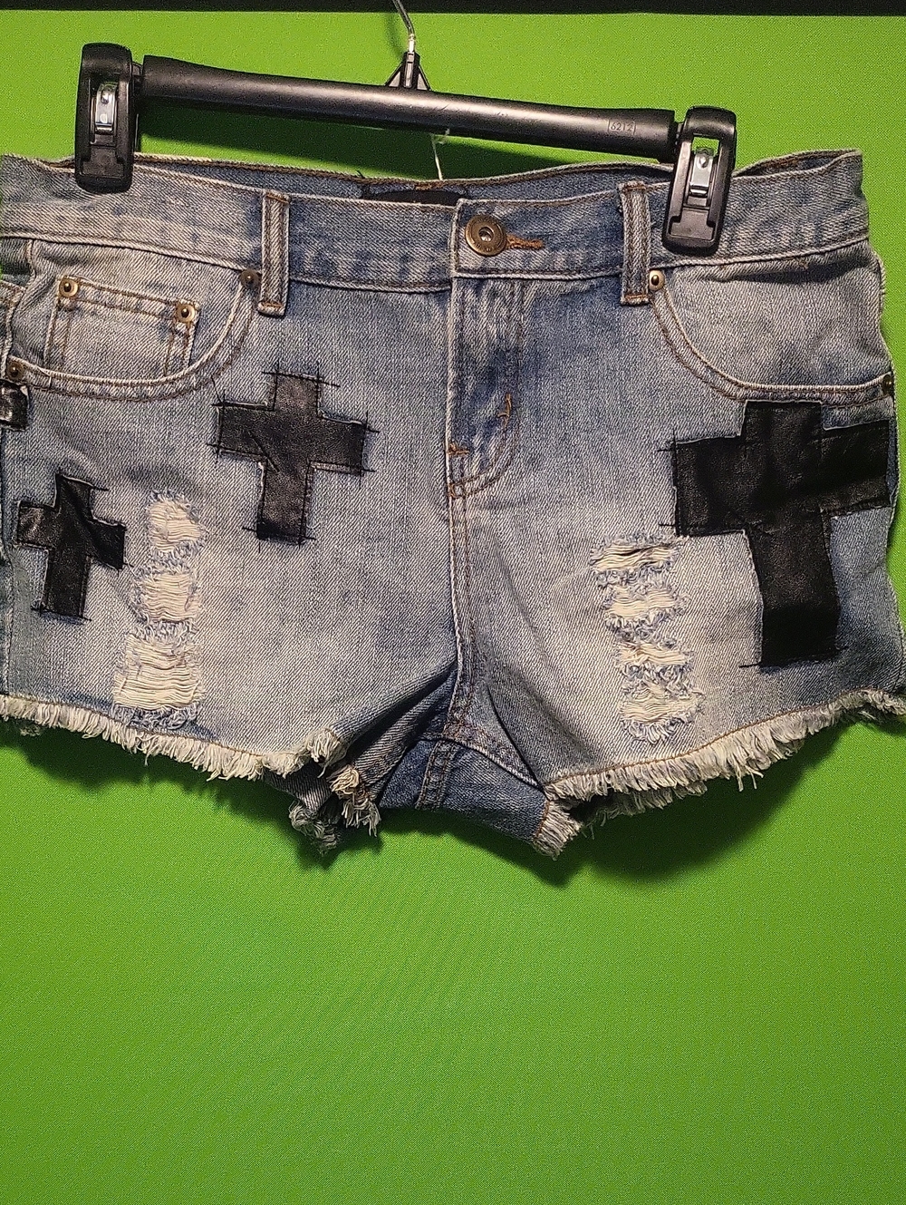 Distressed Denim Shorts with Black Cross Patches
